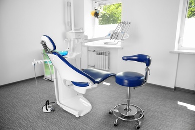Dentist's office interior with modern chair and equipment