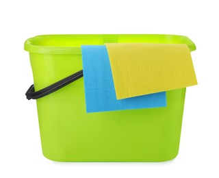Green bucket with rags isolated on white